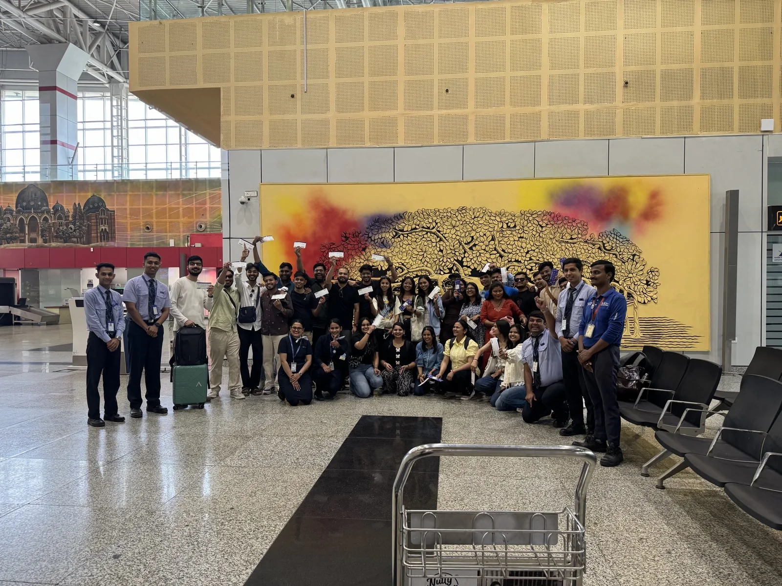 The Sharedpro team posing together at the airport before their offsite